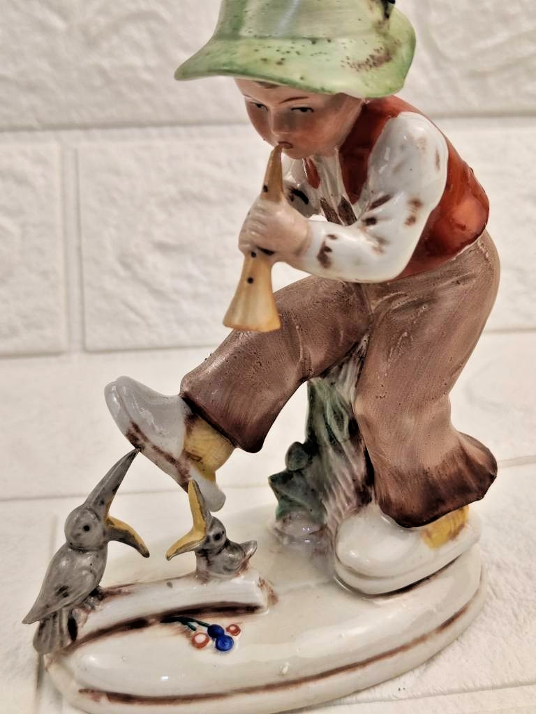 1960s German Porcelain Figurine “Boy with Flute and Birds “