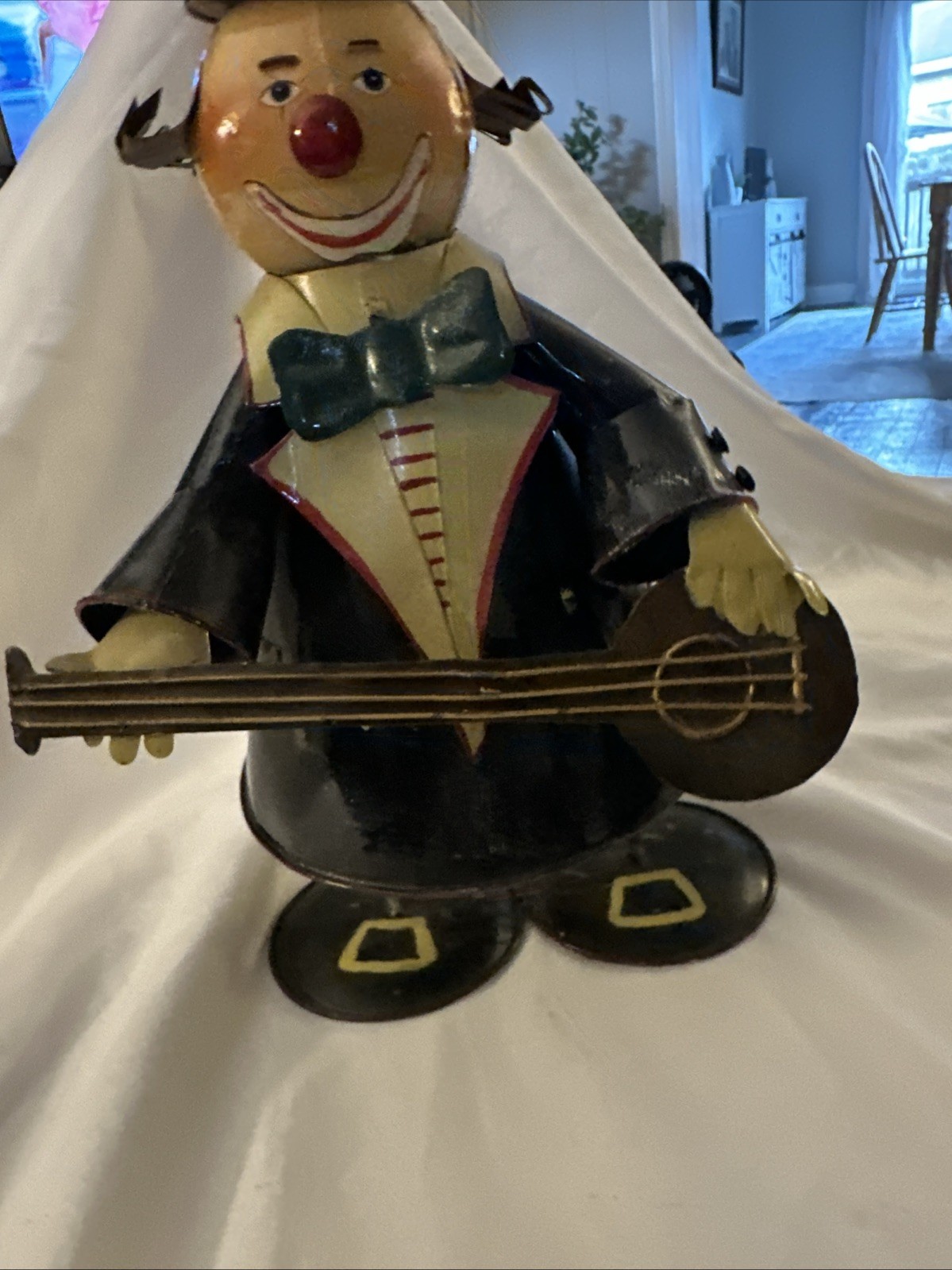 1950’s hand-painted rustic metal clown sculpture. On Vintage Spring So He Moves