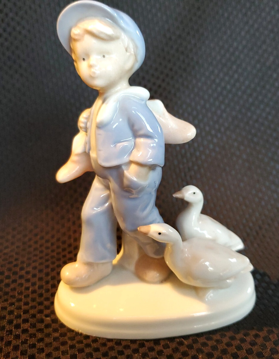 Vtg Boy With Ducks Geese Porcelain Figurine Carrying Pink Shoes Blue White Japan