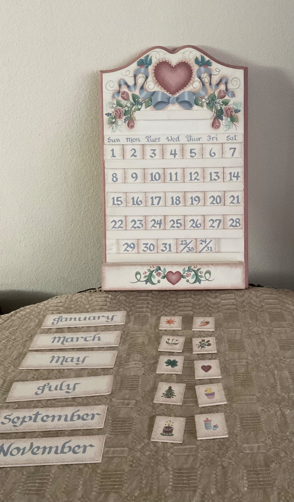 Wooden stork and co folk art wall calendar, with reversible month rectangles