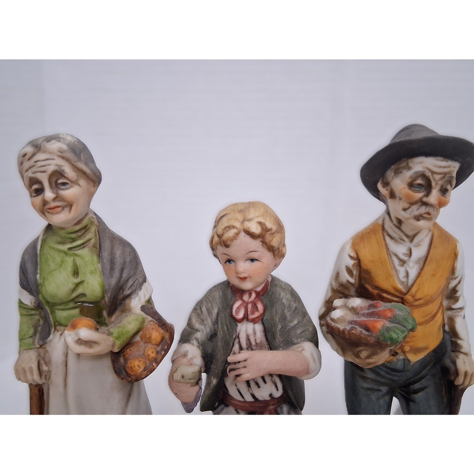 Old World Farmers Man Woman Boy Vintage 20th Century Bisque Porcelain Figurines