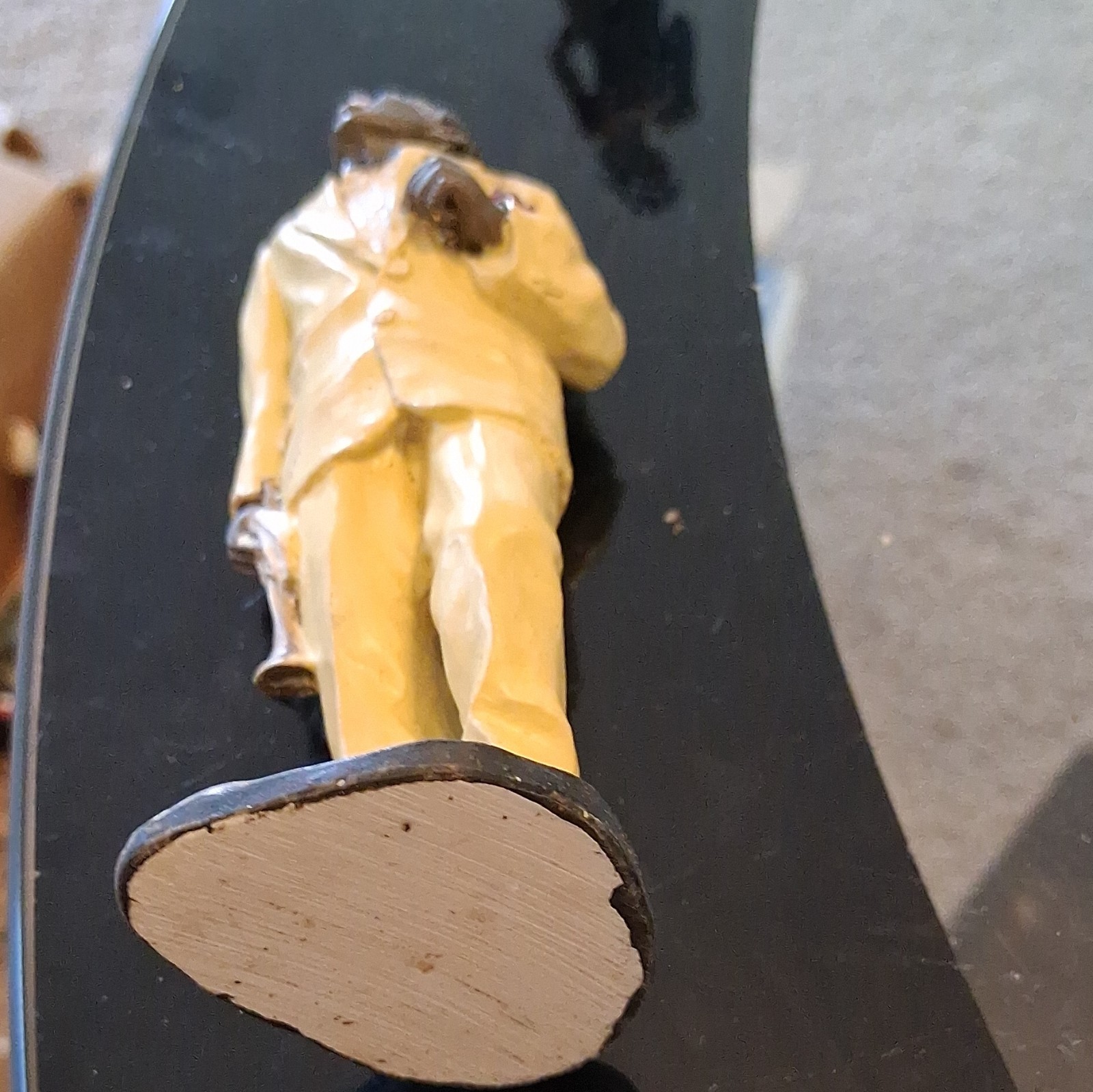 Resin Painted Musician Man Figurine Yellow Black White Music Theme Sculpture