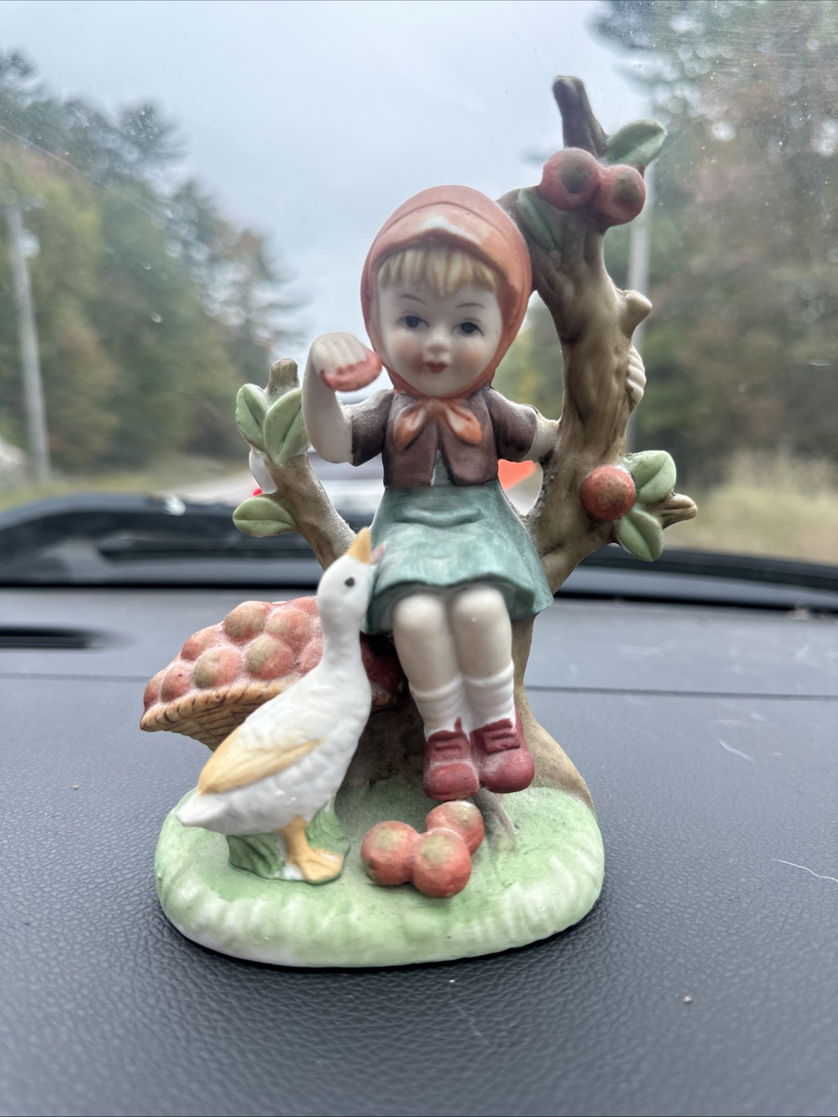 vintage mid-century bisque porcelain “Girl in Apple Tree with Goose” figurine.