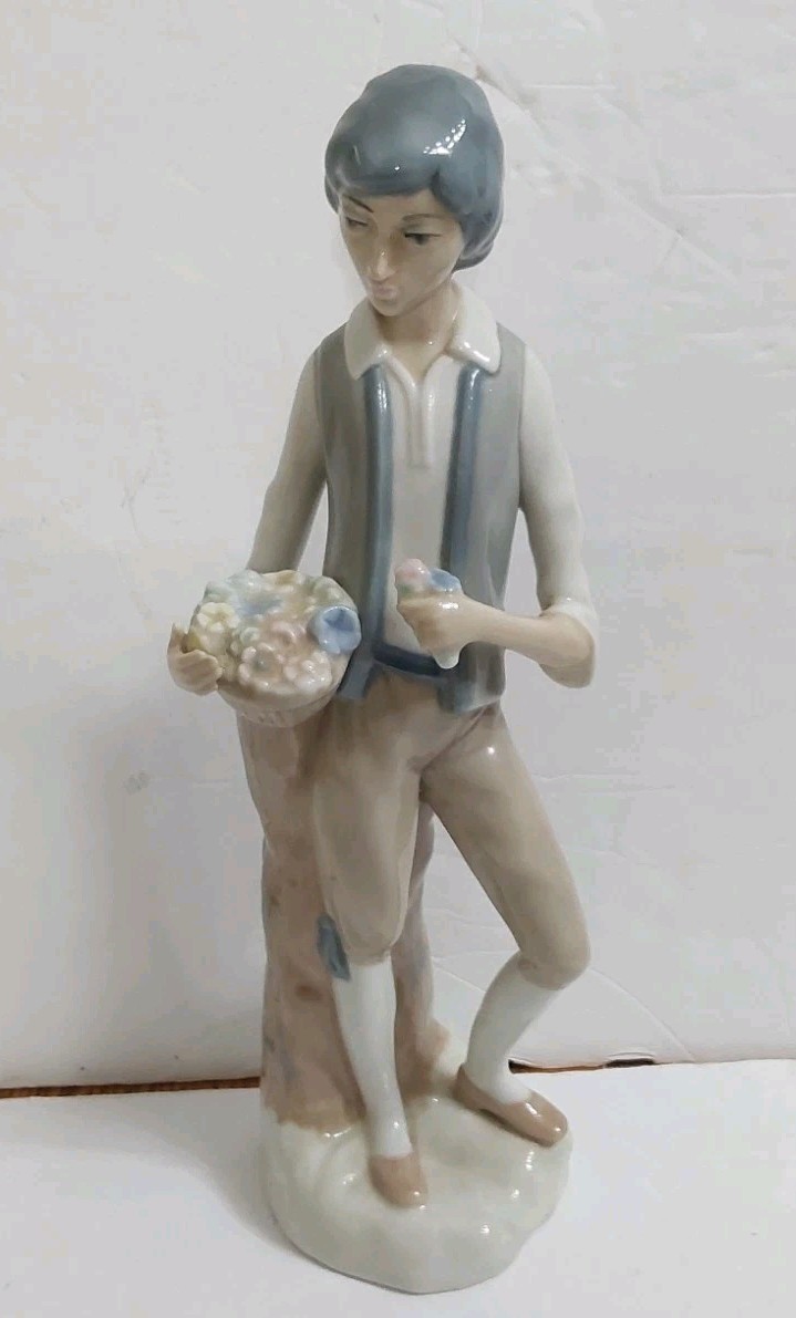 Vintage Porcelian Casades Figurine. 12in.