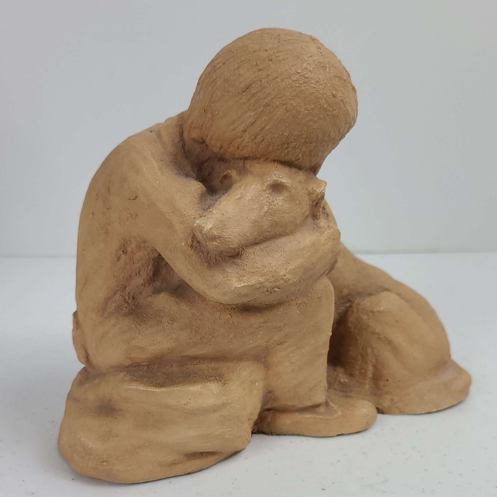 Boy and His Dog Figurine Approx. 5 3/4”H x 7″L Resin ? Painted Matte Sand Finish