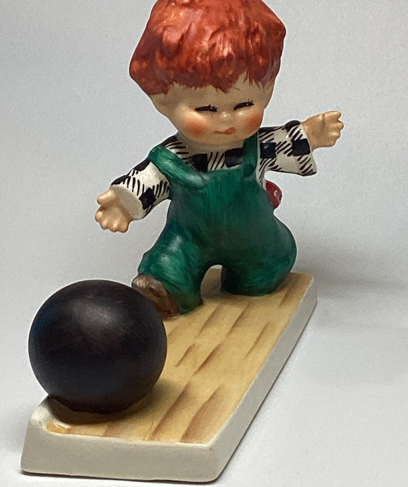 Cute Vintage Goebel Figurine Strike Red Head Bowling