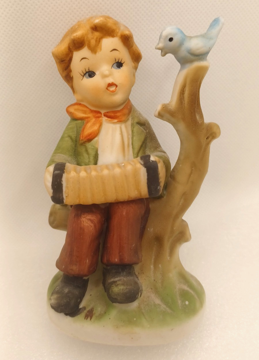 VTG YOUNG BOY PLAYING AN ACCORDIAN TO A BLUE BIRD ON A BRANCH-4 3/4″ TALL
