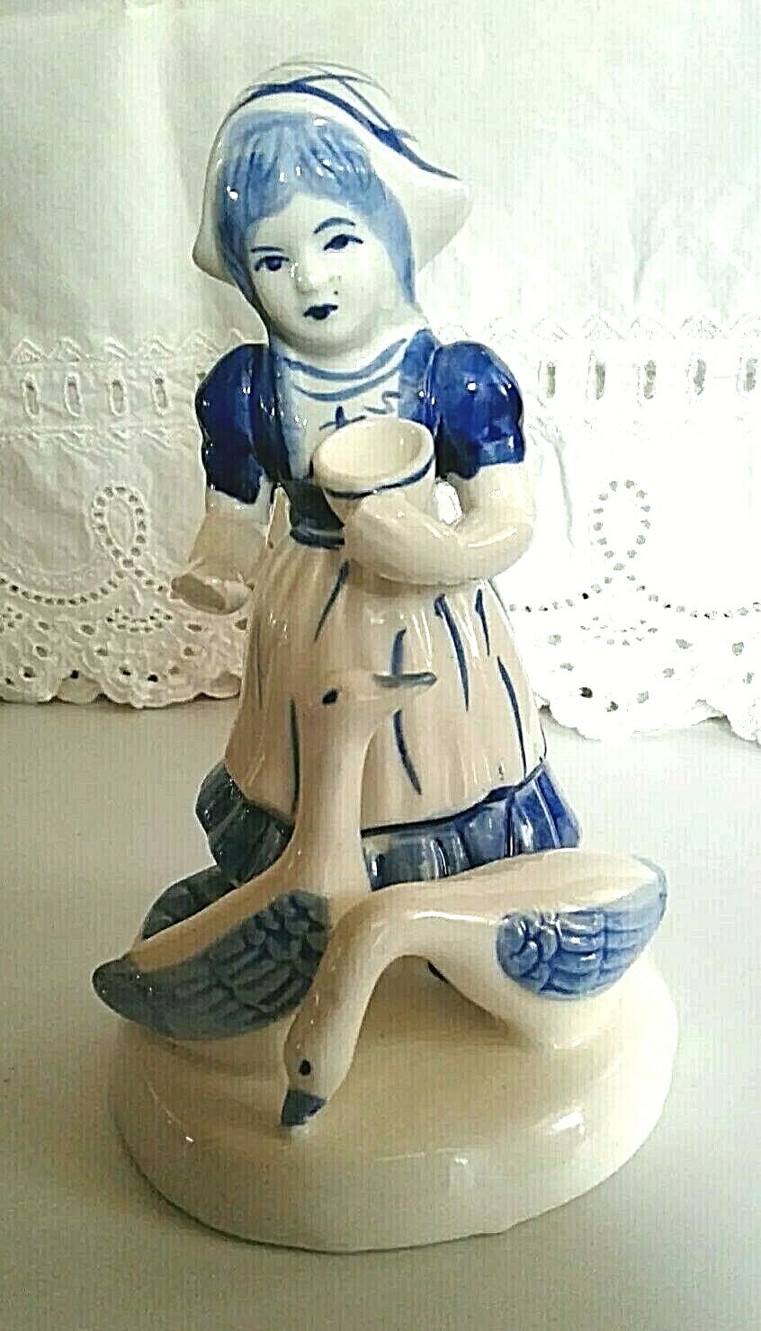 DELFT MAIDEN FEEDING GEESE, 7 INCHES TALL, 3 1/2 INCHES WIDE