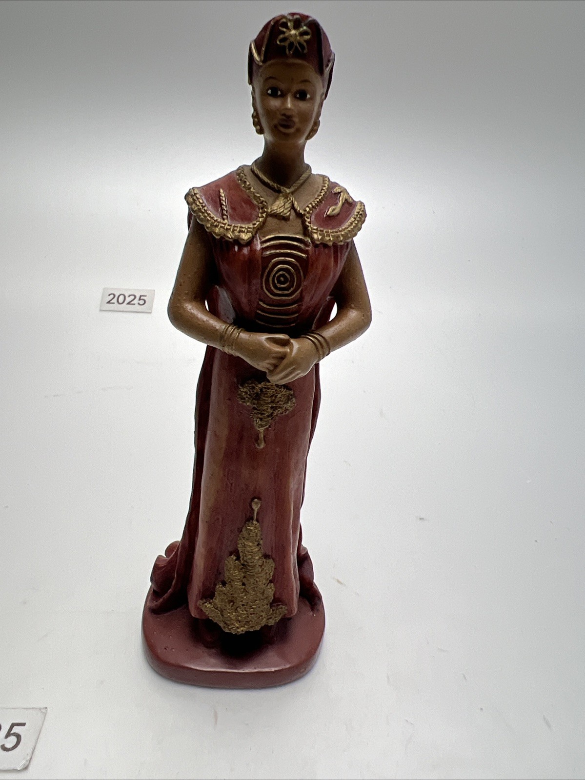 African Woman Figurine in Brown and Gold Dress 1980 S