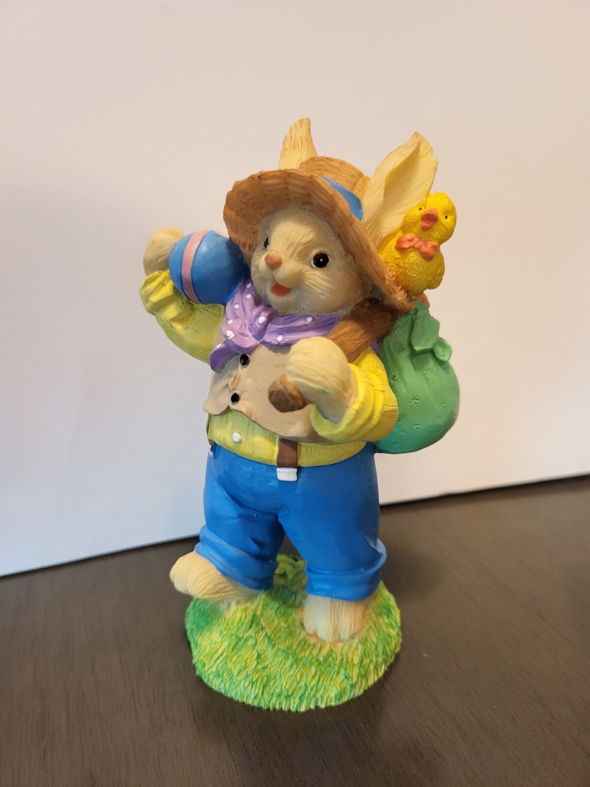 Easter Bunny Figurine Carrying Colored Eggs