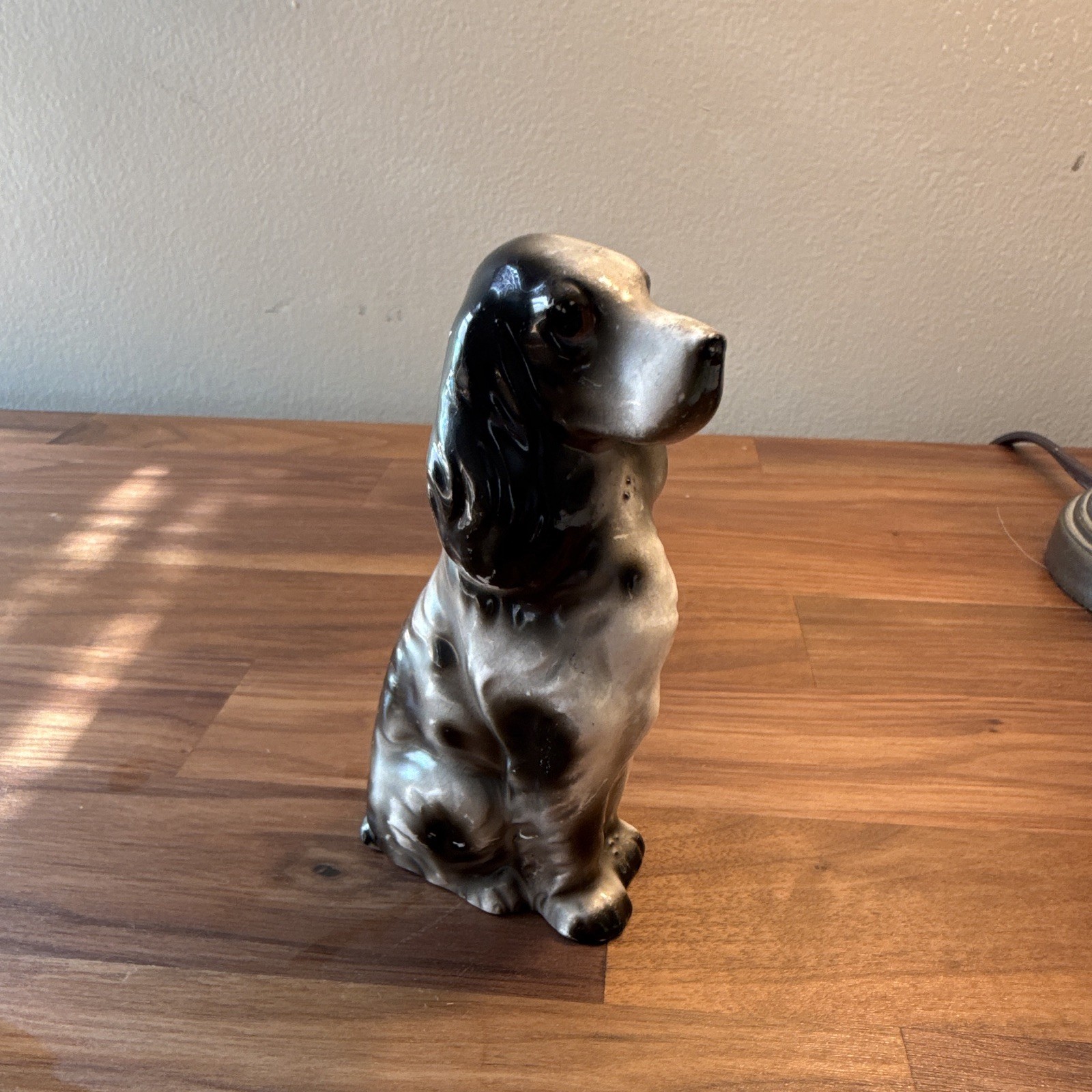 Cocker Spaniel figurine, likely manufactured in Japan during the mid20th century