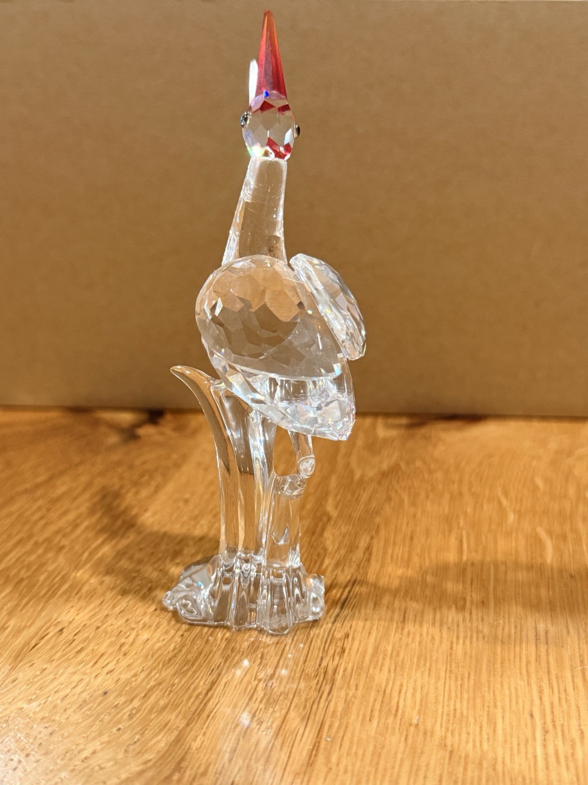 Swarovski crystal wading bird/crane-type figure with a red faceted crest