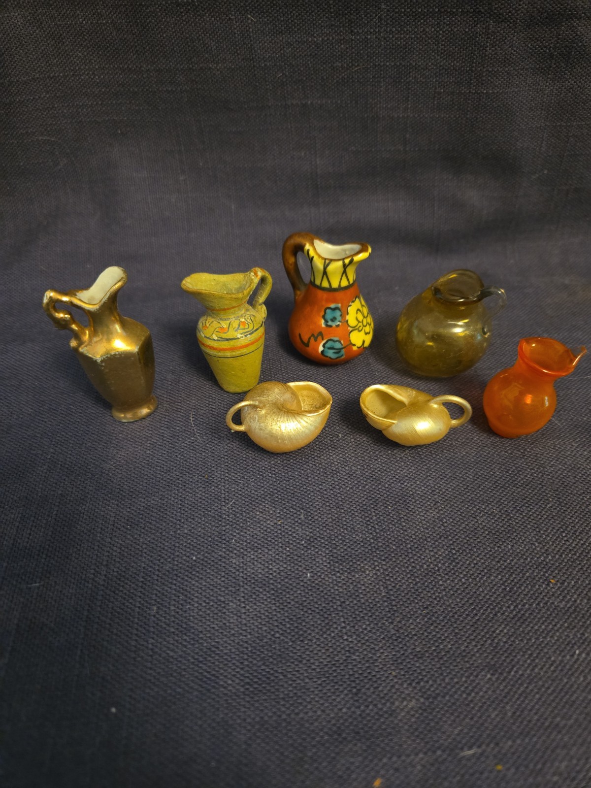 7 miniature pitchers tallest is 2″ ceramic glass shell Japan gold