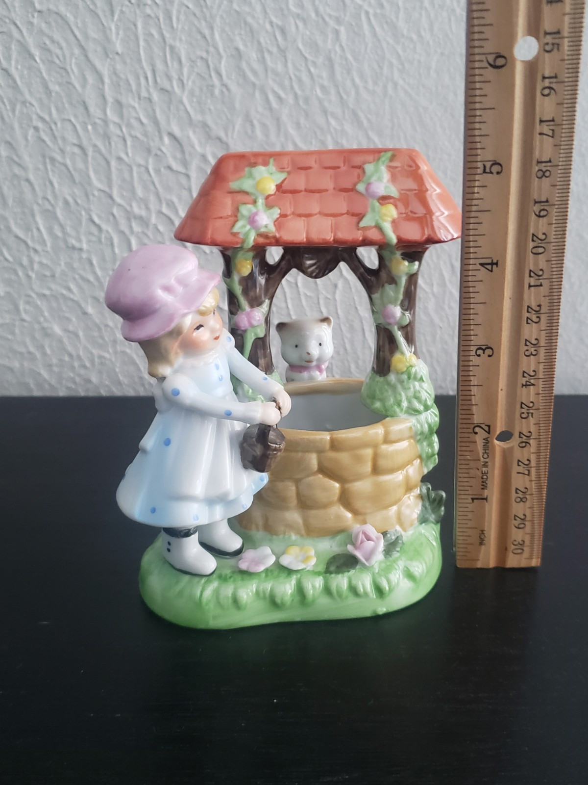 Vintage girl with cat at wishing well hand painted figurine made in Korea
