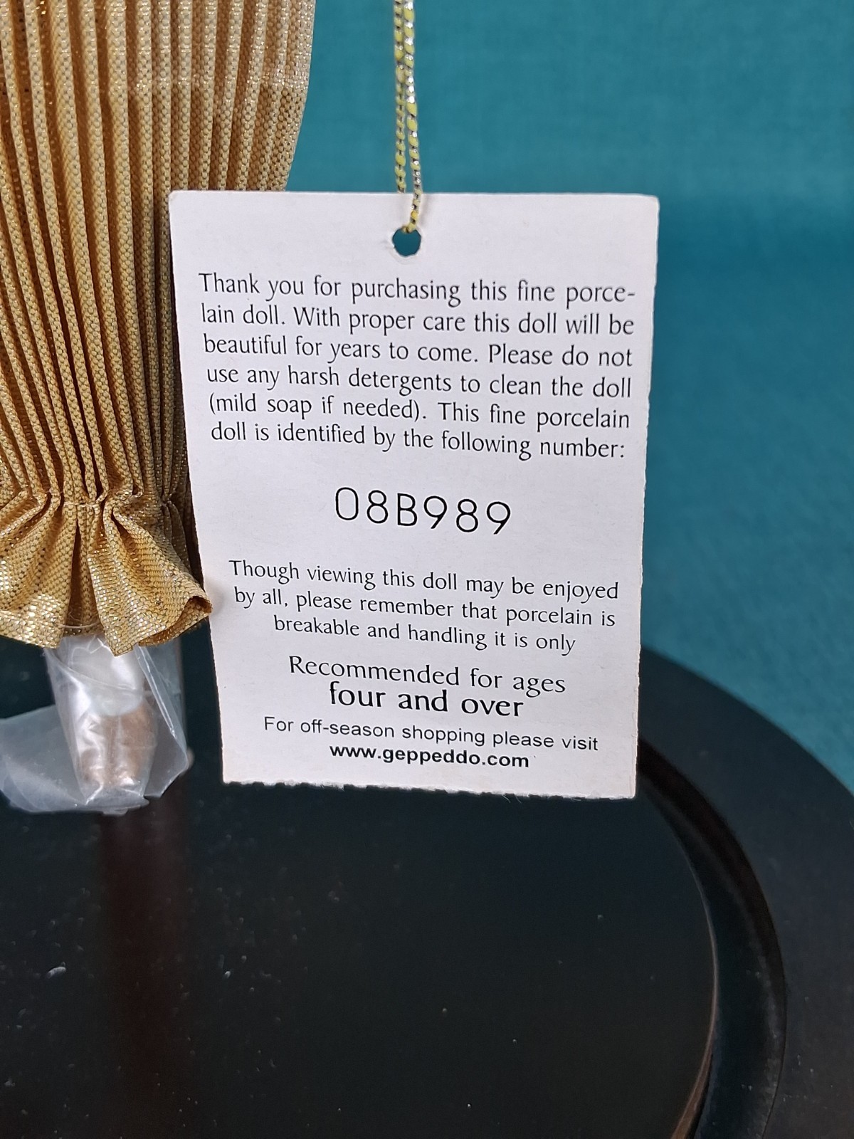 Geppeddo Porcelain Doll Gold and Pink Costume with Tag