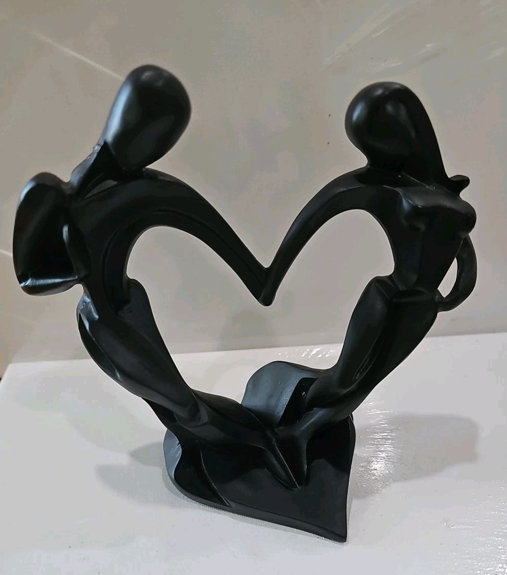 Couple Celebrates Love With Dance – 7”x7.5”x4” Black Heart Shape