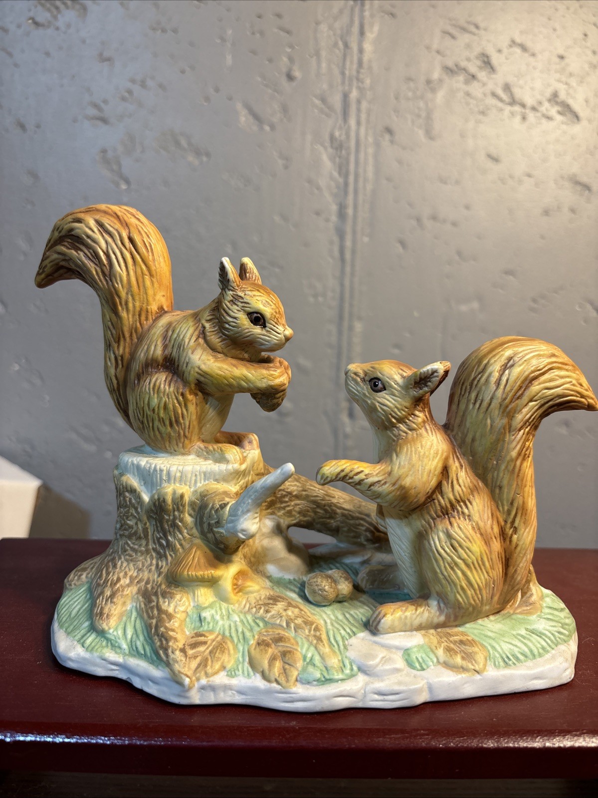 Two Squirrels Gathering Nuts One Squirrel On A Tree Stump