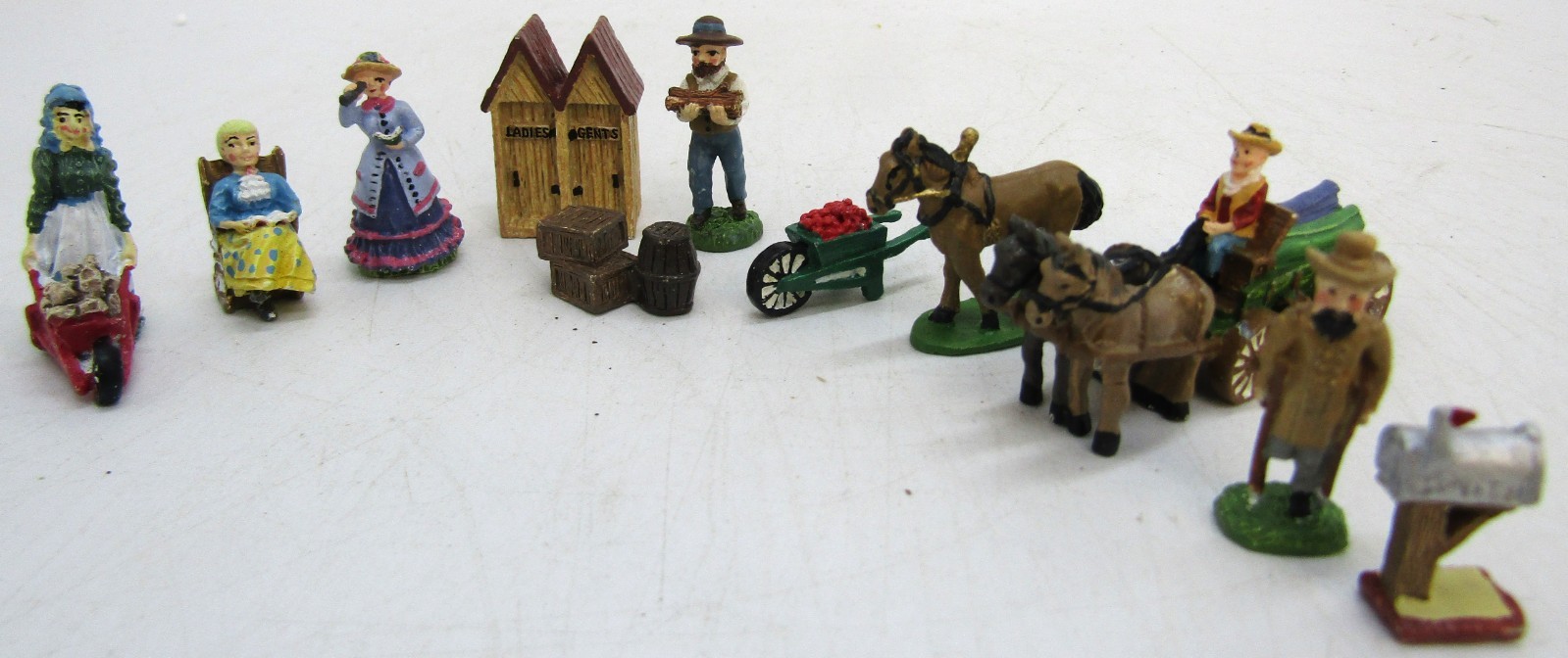 Vintage IRS China Cast Iron Metal Village Figurines, Set of 11.