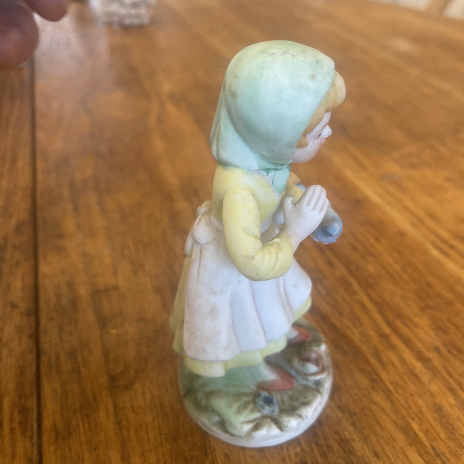 Porcelain Figurine Woman Holding Basket With Bird In Hand Flowers On Base