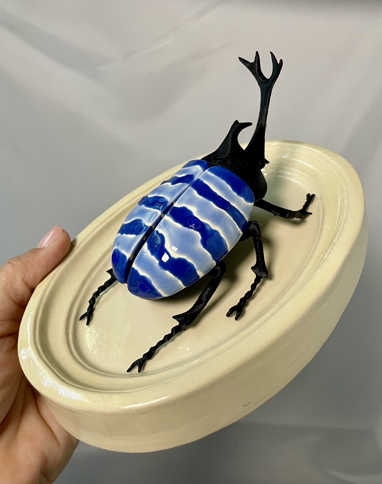 Ceramic Beetle Sculpture White and Blue Wall-Mounted Decorative Art