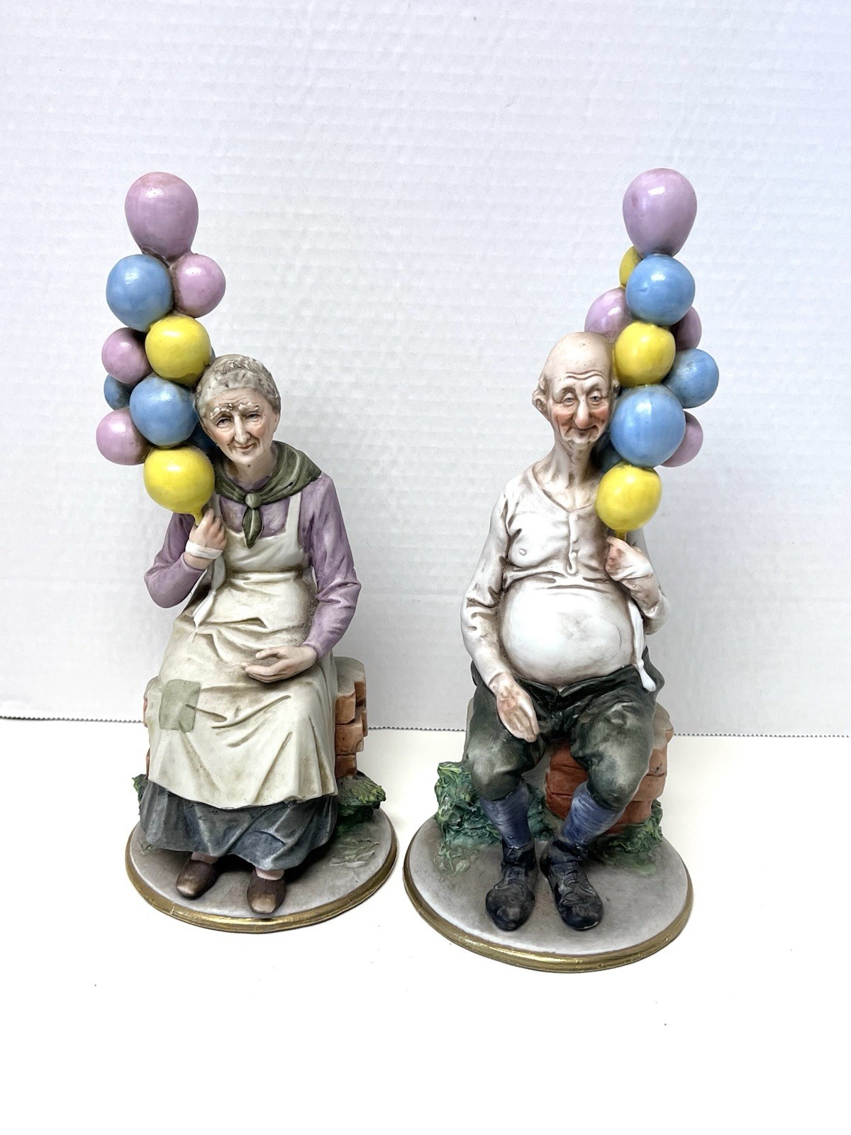 Vintage Pucci SIGNED Capodimonte Old Lady Old Man W/ Ballons Ceramic Figures
