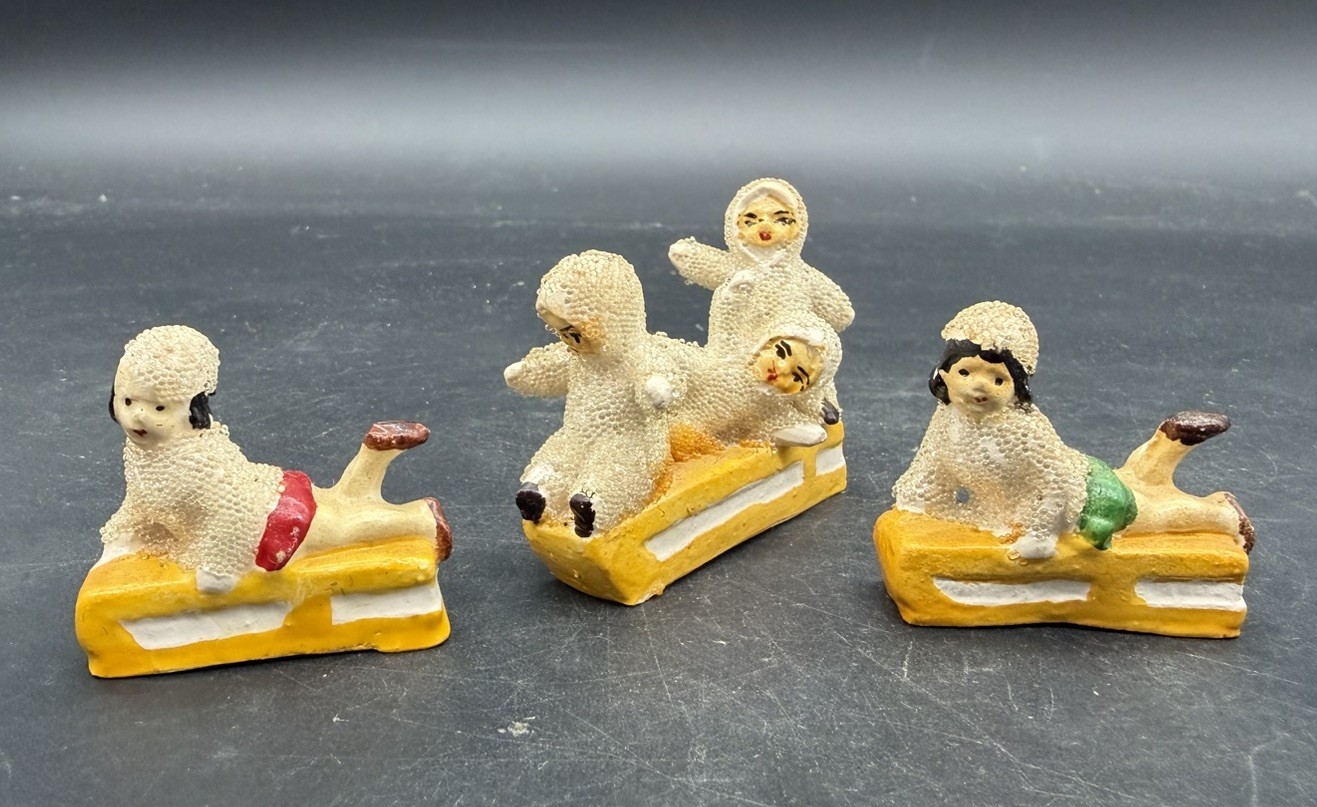 Vintage Set of 3 Coralene Snow Babies Girls on Sleds Figurines