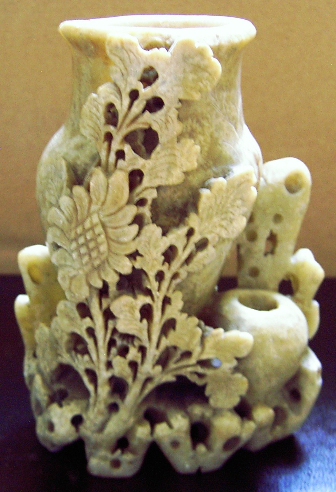JADE, floral vase, 5.5 inches tall, 1 lb 12 oz. greenish brown, hand carved.
