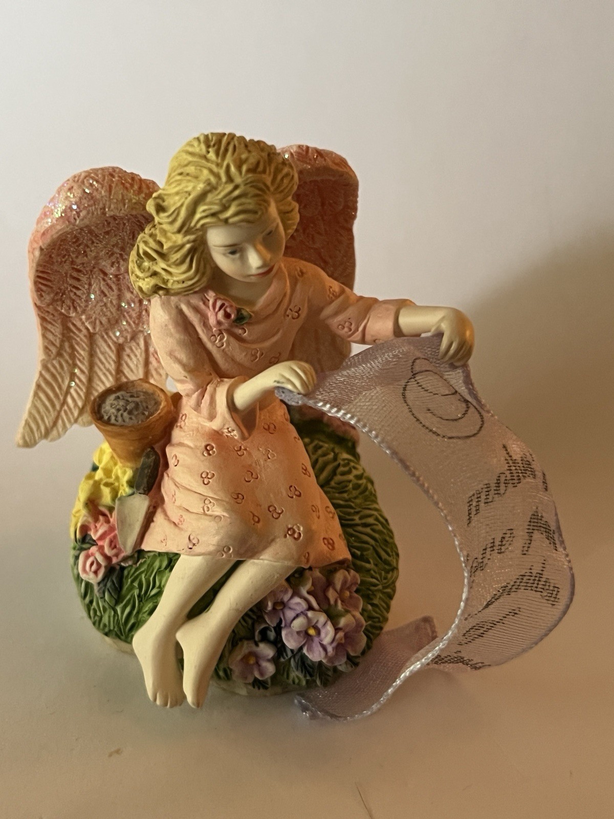 A mother’s love grows a garden of happiness – figurine angel 2 1/2”