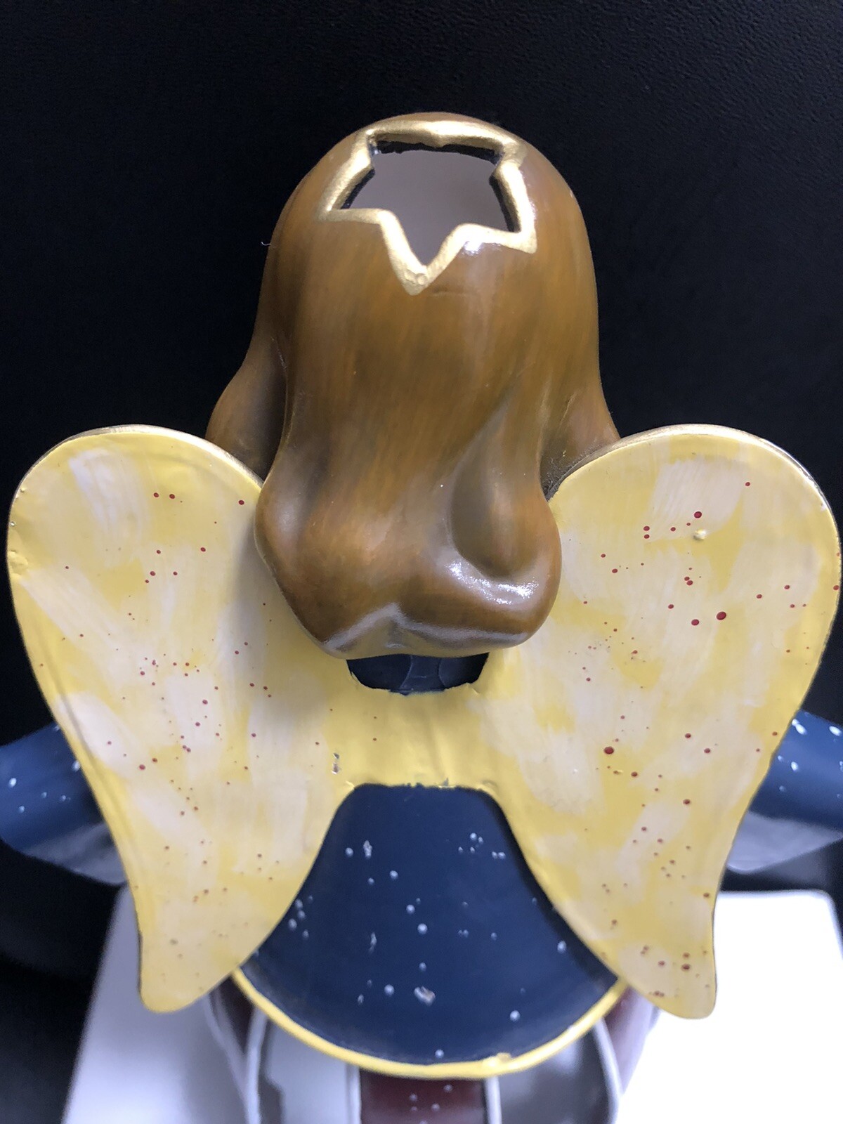 10” angle figurine. metal body ceramic head