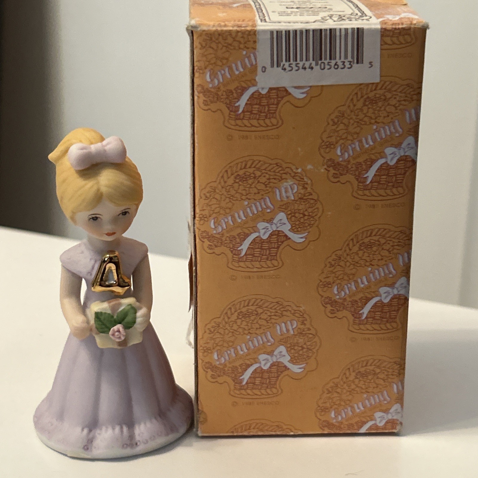 ENESCO 1981 Growing Up Baby Girl Age 4 Porcelain Figurine Blonde Hair