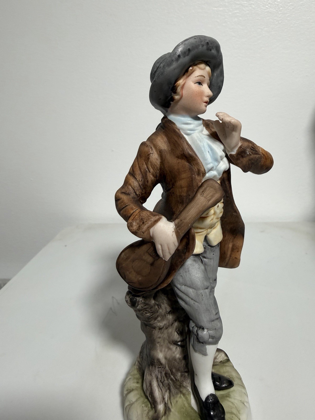 Vintage Porcelain Figurine Of Colonial Man In Detailed Attire