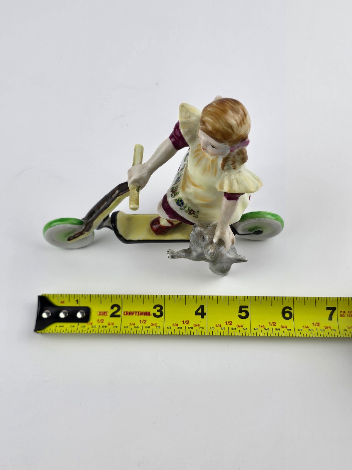 Vintage Hand painted Porcelain Girl on Scooter with small dog Unmarked