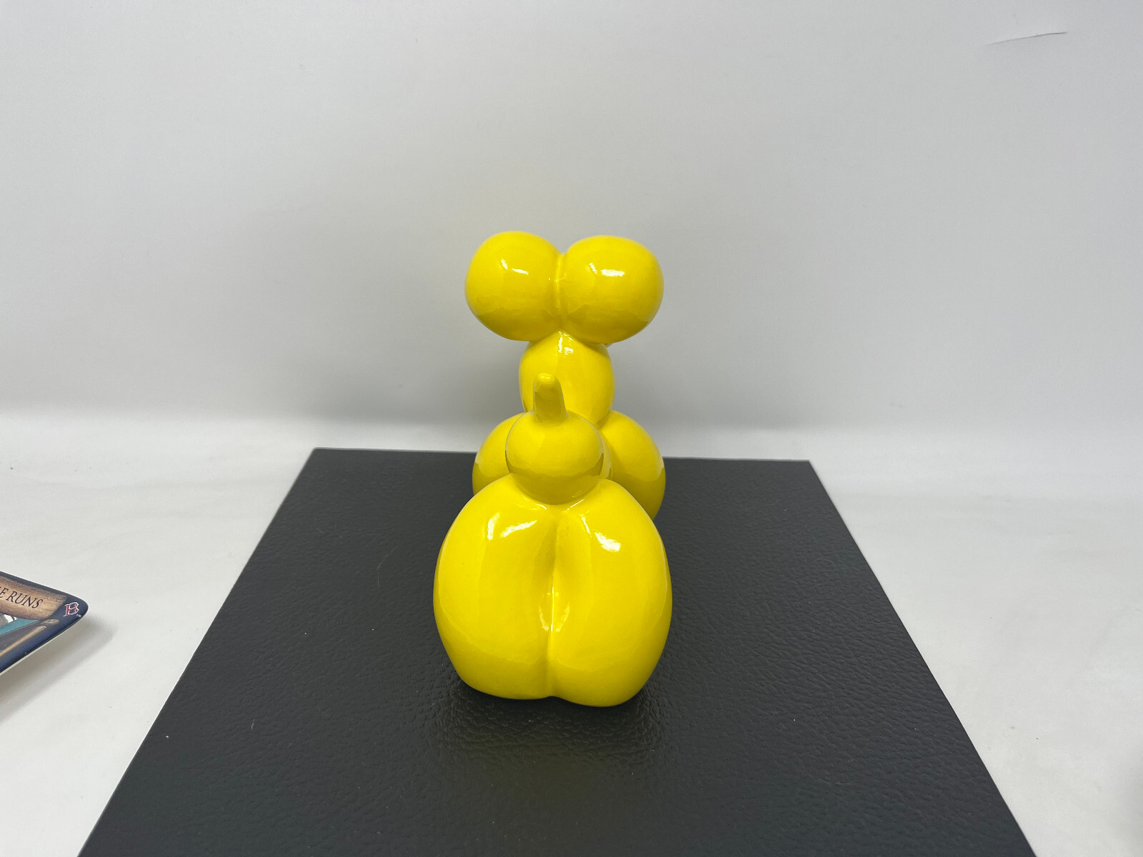 YELLOW CERAMIC RESIN BALLOON DOG FIGURINE- 4.5″ x 6″