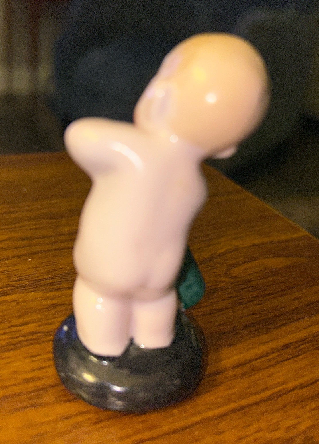 Vintage Porcelain Baby Pulling Cork From Bottle Figure