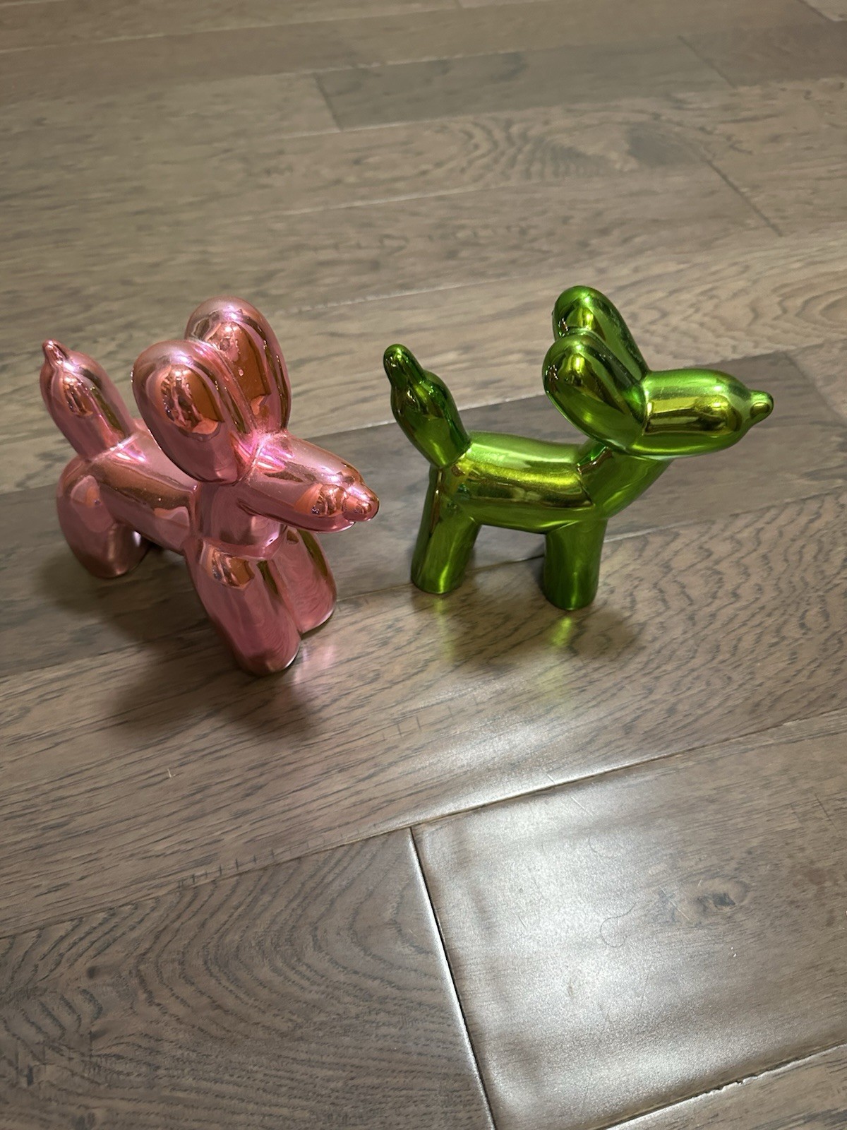 Two Balloon Dog Figurines