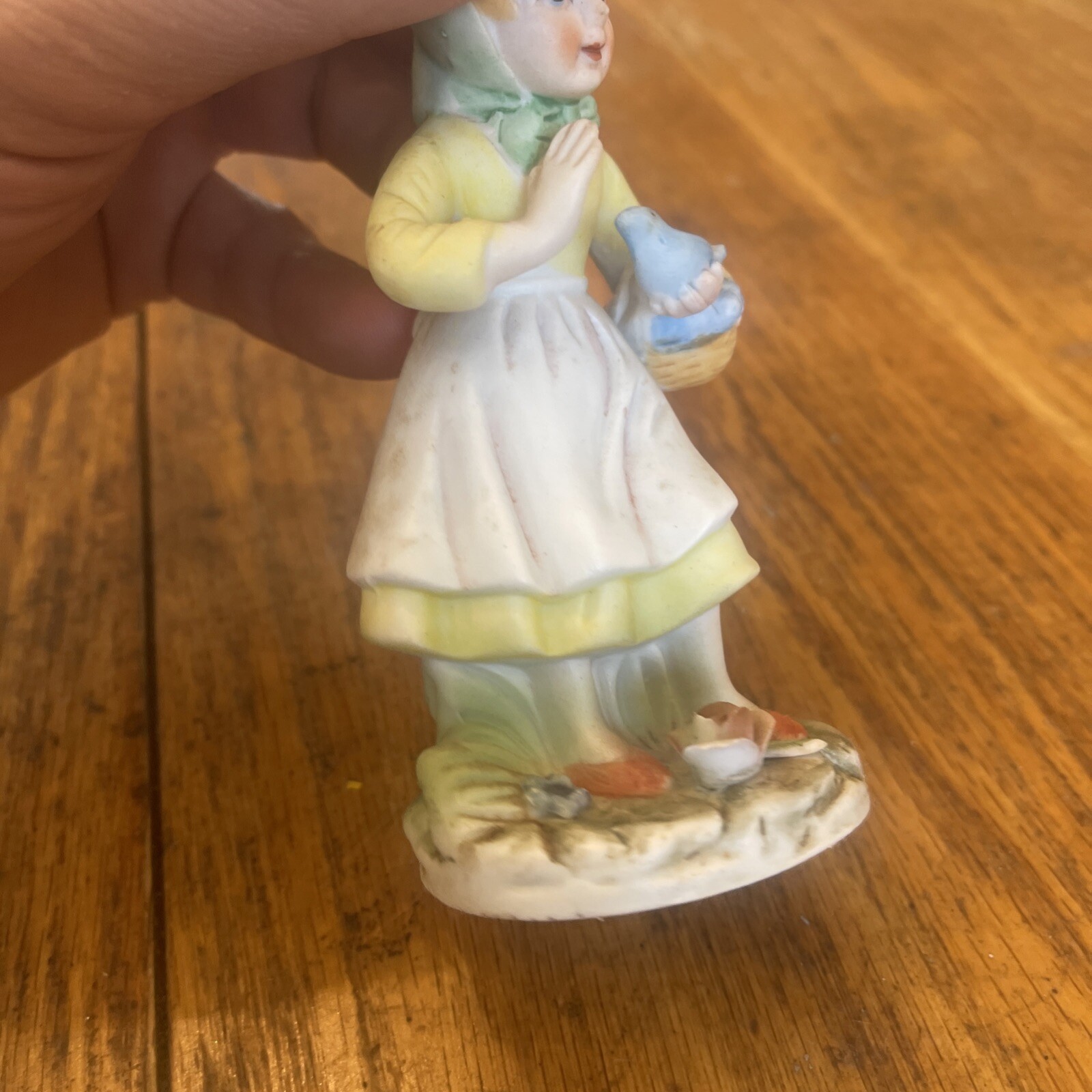 Porcelain Figurine Woman Holding Basket With Bird In Hand Flowers On Base