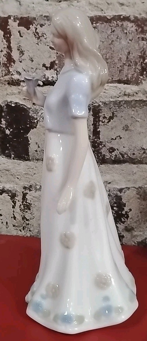 Porcelain Girl With Flower In Her Hand Figurine -Glossy- 8” *C