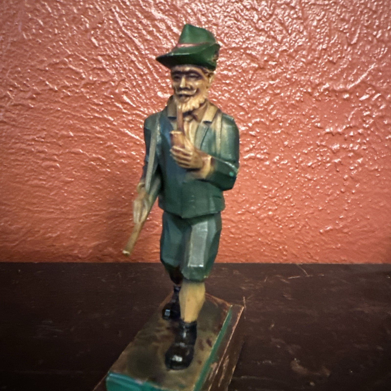 Vintage celluloid Or Resin Hunter Figurine 6″ tall With Gun & Pipe Hand Carved