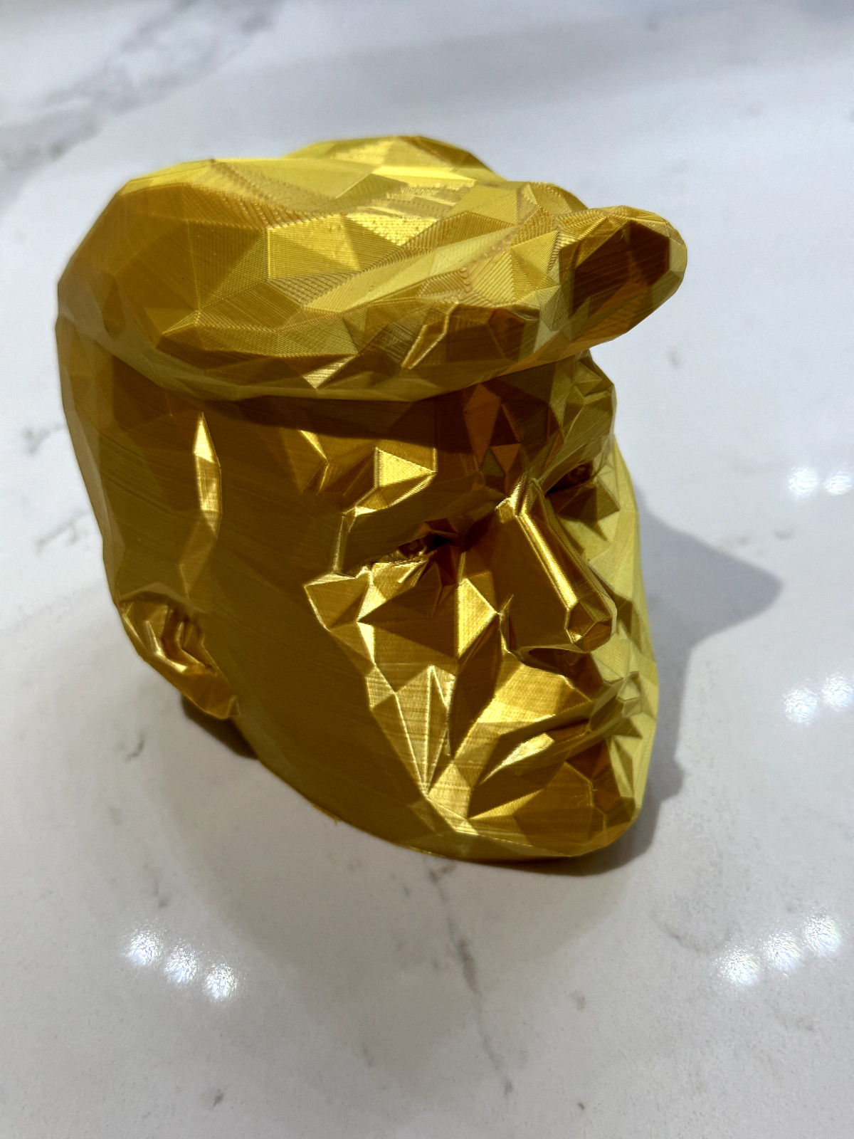 Stylized Gold Sculpture of Donald Trump’s Head (PVA Plastic)