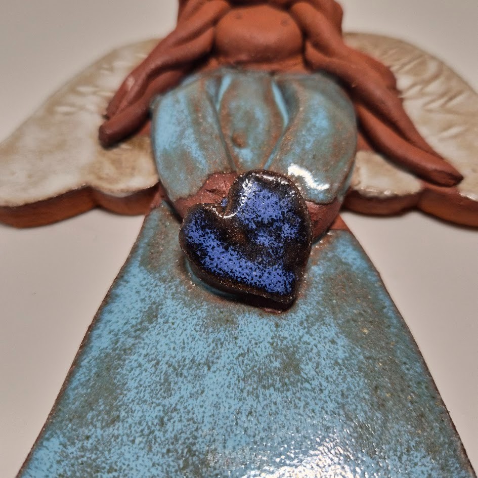 Handmade ceramic angel wall hanging