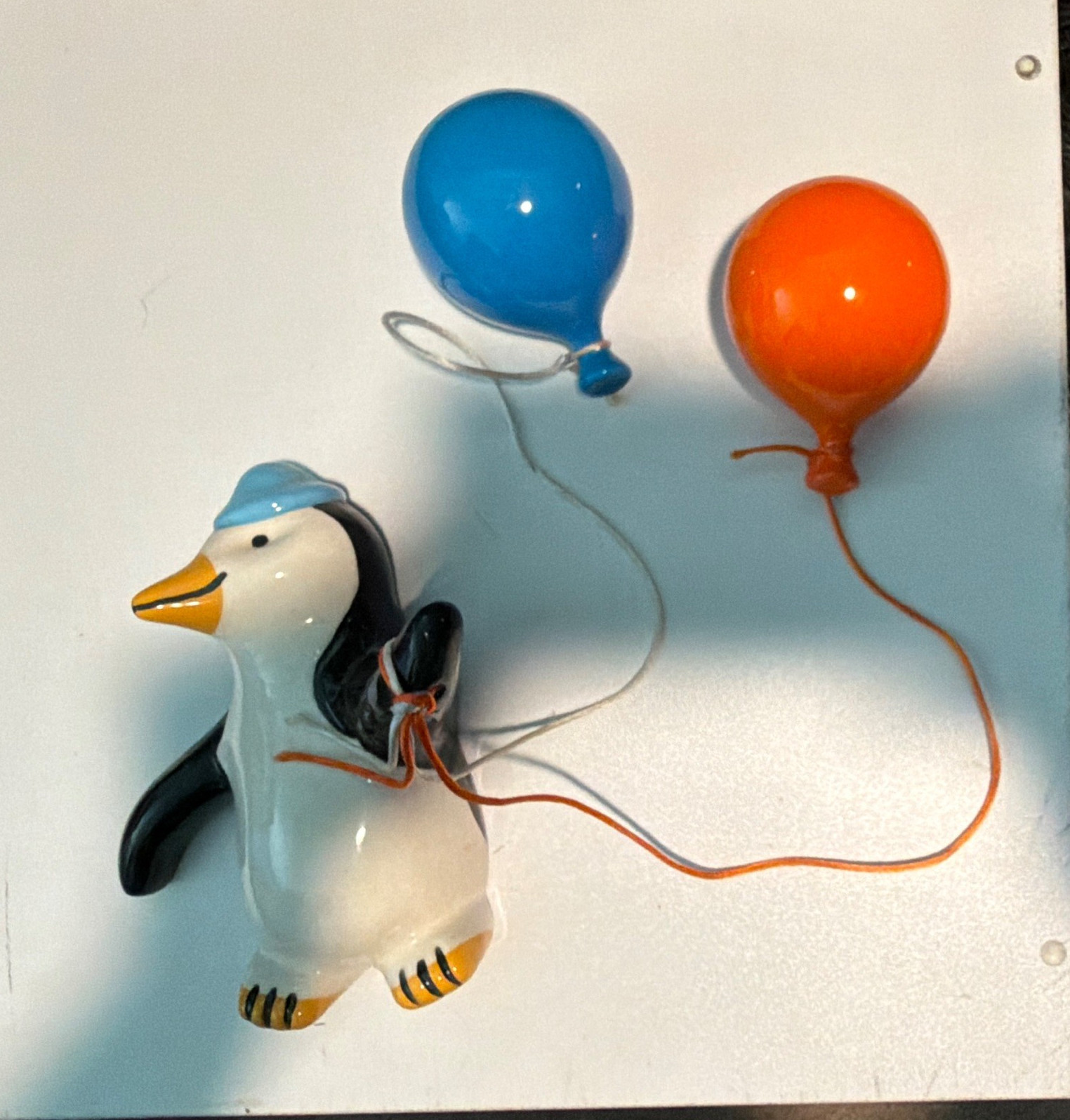 Vintage Ceramic Hanging Penguin Figurine w/ Blue & Orange Balloon
