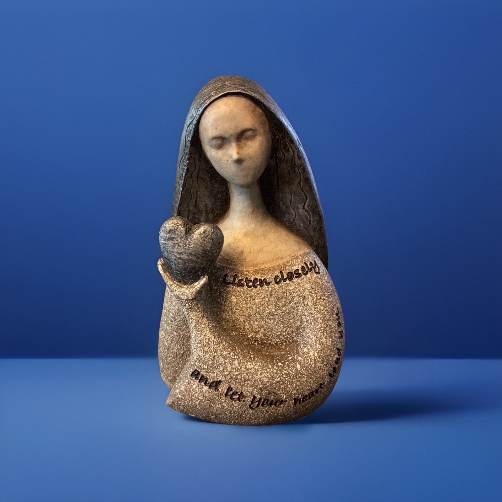 Listen Artstone by Carson Home Accents Women Holding Heart Resin Figurine