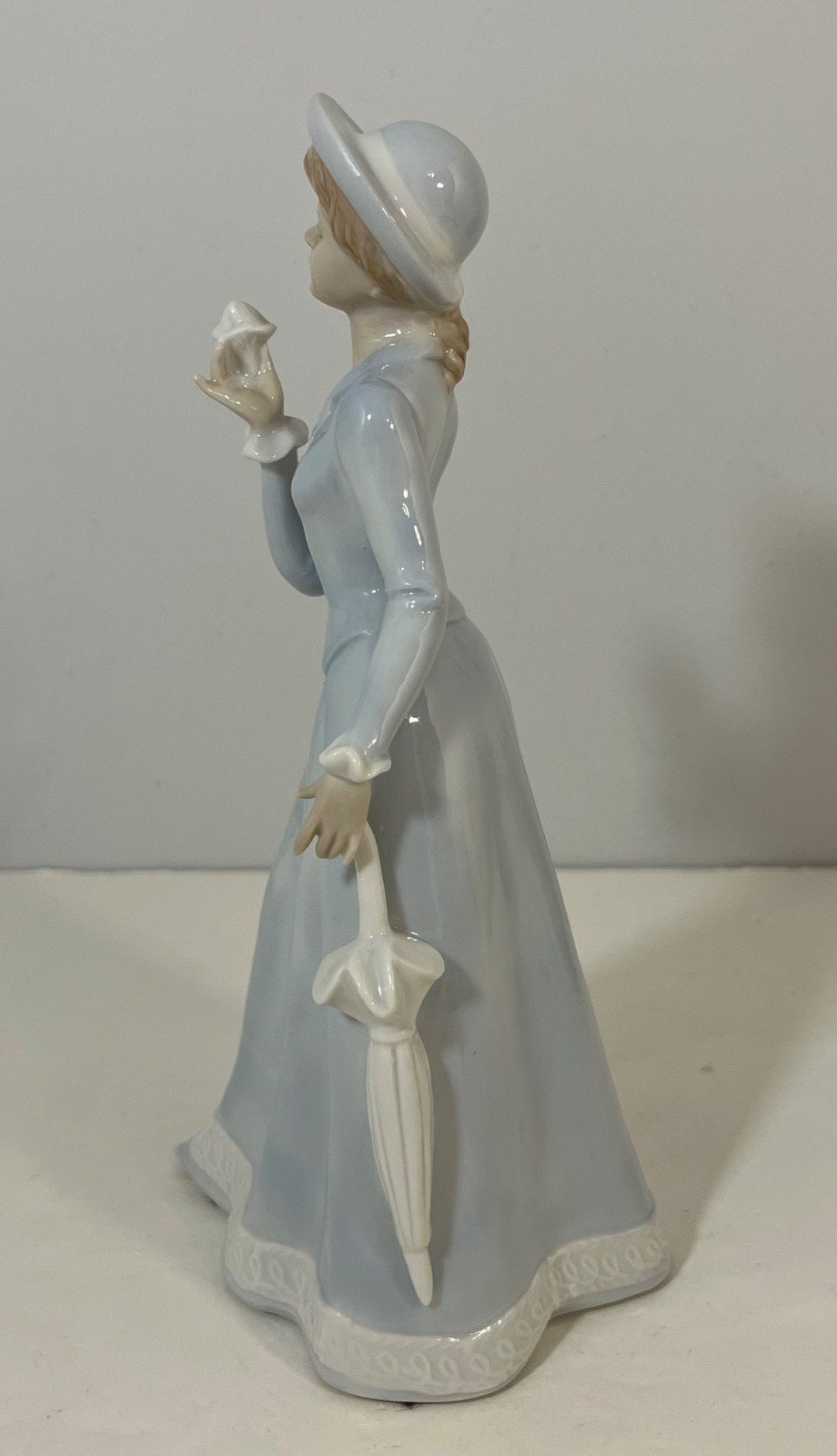Ethan Allen Porcelain Figurine Woman in Blue and White Dress with Parasol F007A