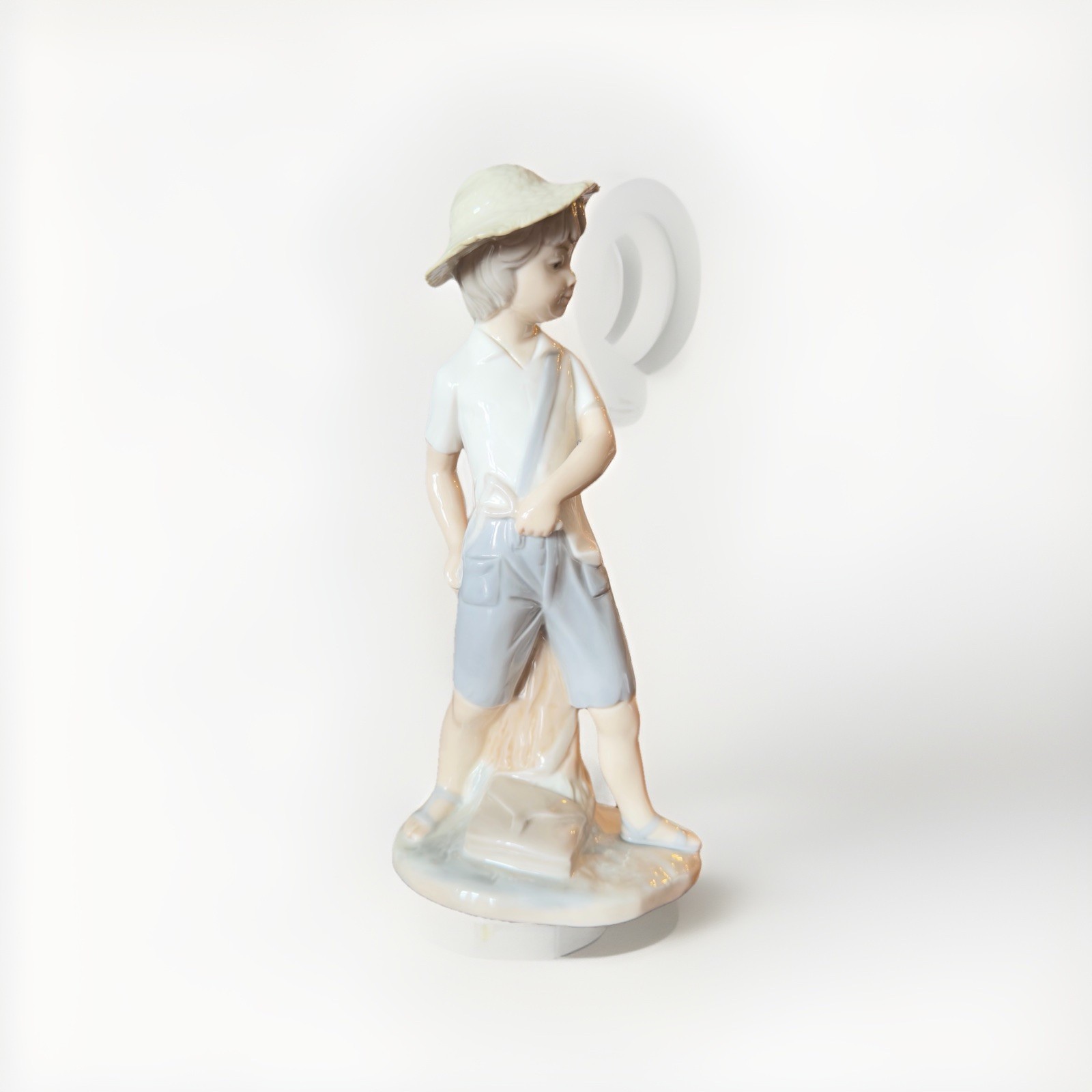 NAO by Lladró 8-1/2” Boy with Slingshot Figurine, Spain, c. 1970-90s