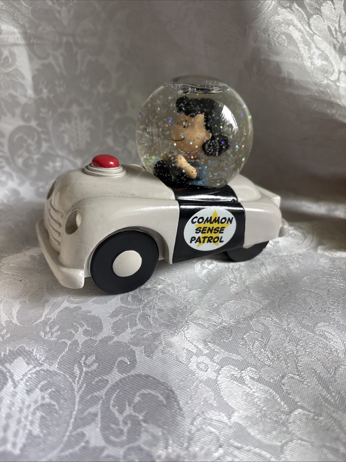 2013 Hallmark Peanuts Gallery Lucy Driving Common Sense Patrol Car Snow Globe