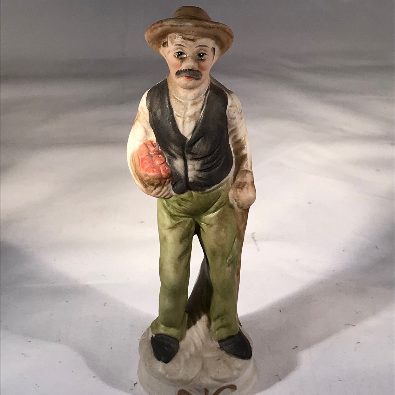 Flambro Fine Porcelain Figurine Man Vest Hat Basket Produce 5 3/4 Inches Tall