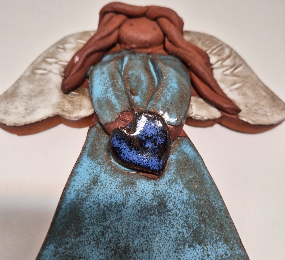 Handmade ceramic angel wall hanging