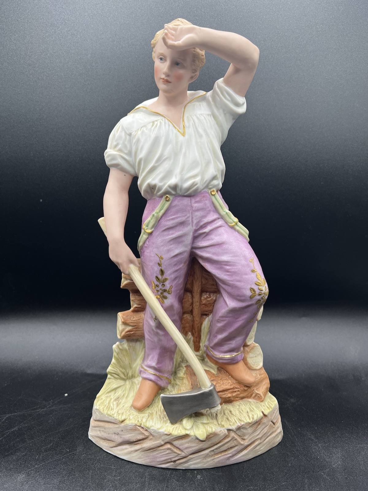 Gebruder Heubach-German Bisque-A Young Woodsman With His Ax- 13″