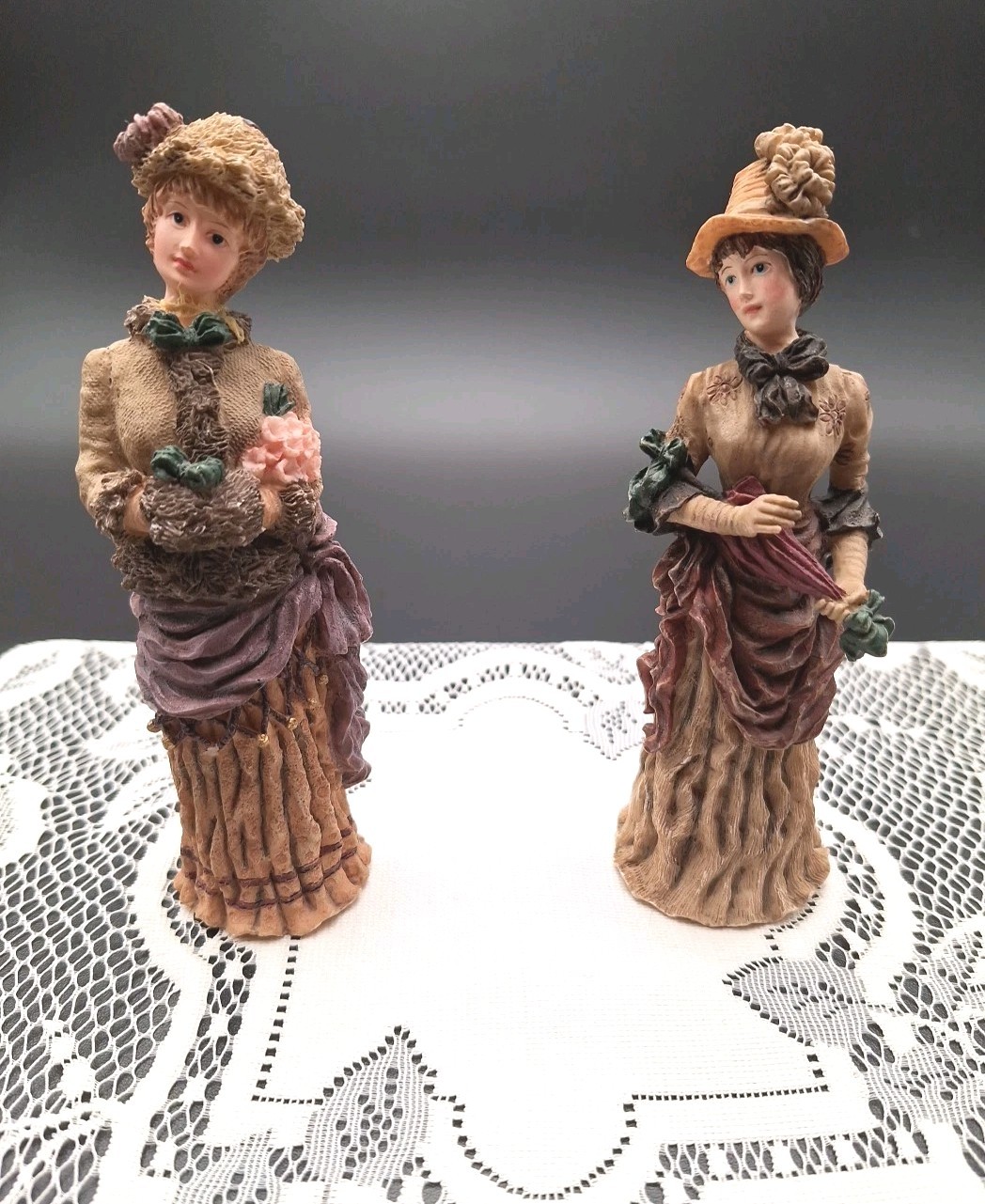 Vtg Lot Of 2 Victorian Lady Figurines Holding Furr Muff- Holding Umbrella Pretty