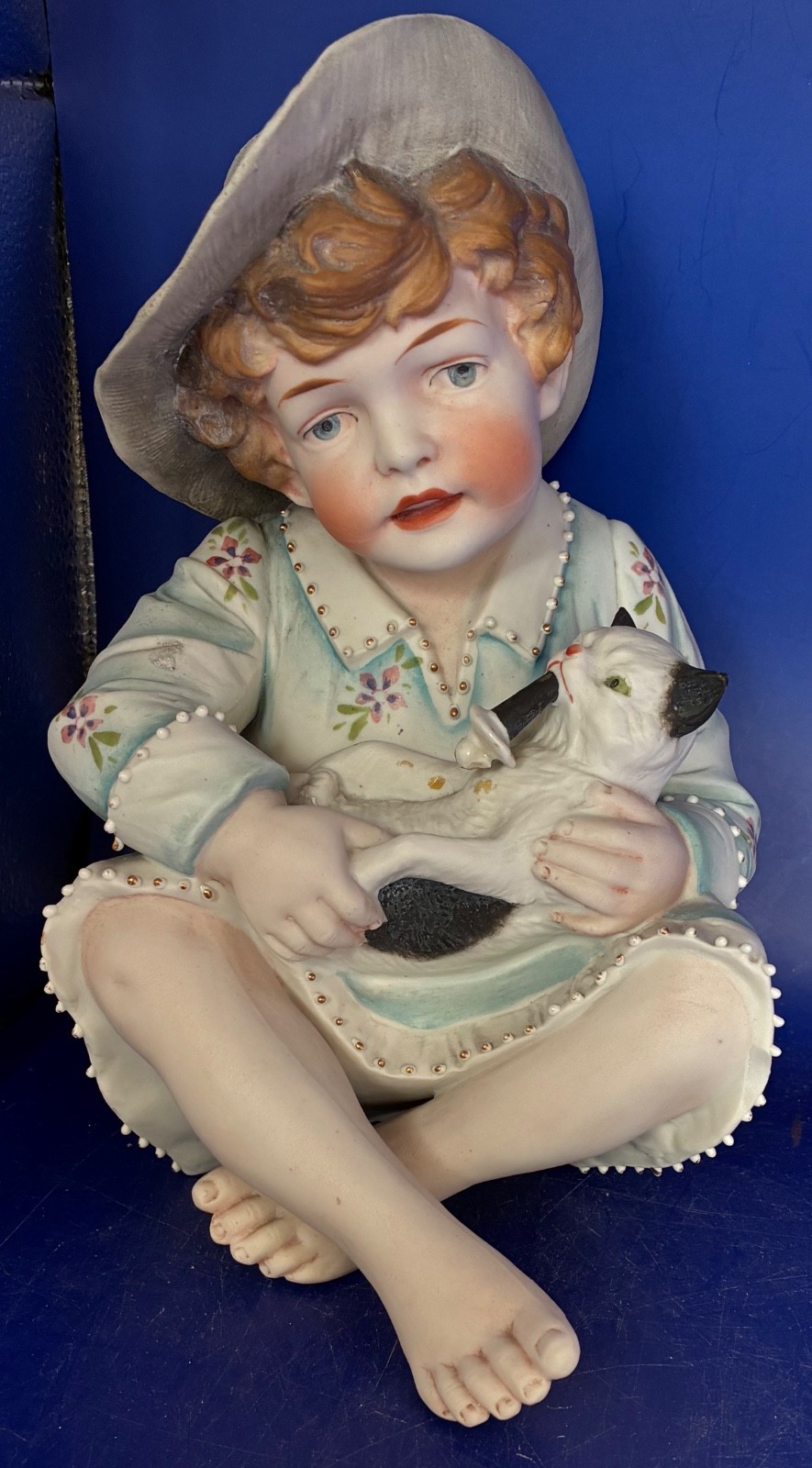 1880s Era Bisque Figure Young Boy Holding Cat